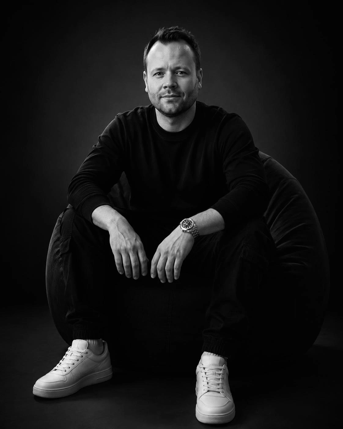 Chris, founder and developer of MoonFruit, in a black and white studio portrait